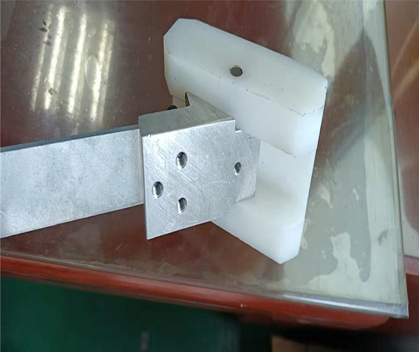 雙邊機壓塊總成